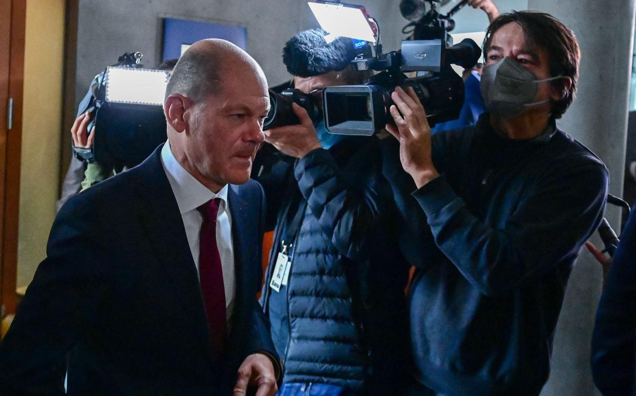 German Finance Minister, Vice-Chancellor, and the Social Democratic Party's (SPD) chancellor candidate Olaf Scholz leaves after he was questioned during a parliamentary finance inquiry over an investigation into an anti-money laundering agency overseen by his ministry, on September 20, 2021 at the Bundestag compound in Berlin. - Scholz's appearance before the German parliament's finance committee comes less than a week before Germans go to the polls in national elections on September 26. (Photo by Tobias Schwarz / AFP) (Photo by TOBIAS SCHWARZ/AFP via Getty Images) - TOBIAS SCHWARZ/AFP