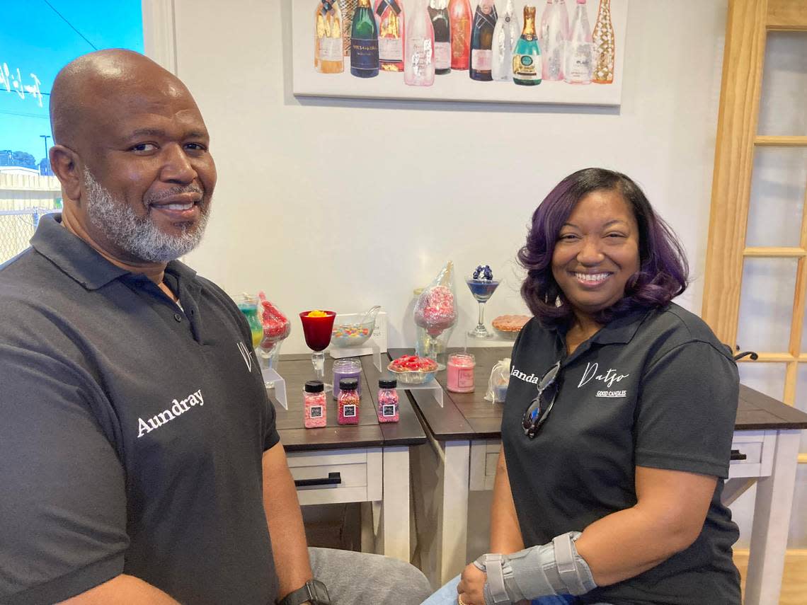 Aundray and Yolanda Barnes selling her candles at La’Vino Wine Bar. The candles may also be ordered through her online business, Datso Good Candles.