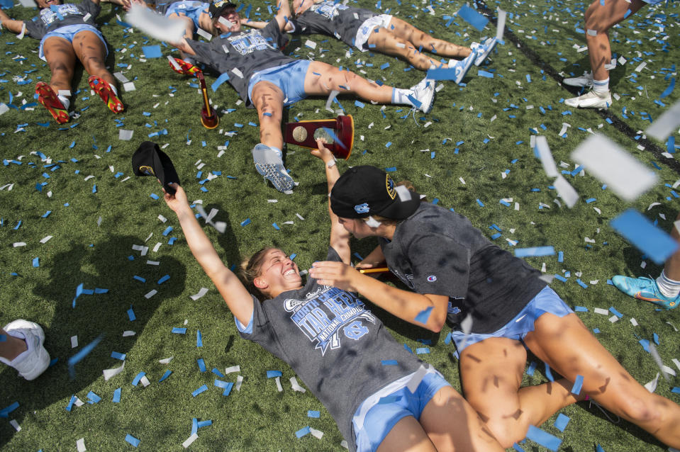 North Carolina players celebrate after winning the NCAA college Division 1 women's lacrosse championship against Boston College in Baltimore, Sunday, May 29, 2022. (Vincent Alban/The Baltimore Sun via AP)