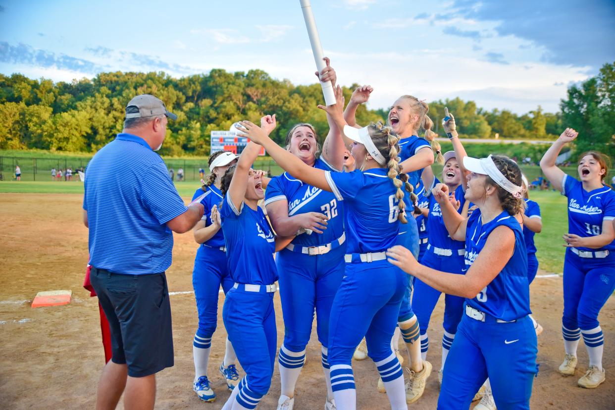 Van Meter players celebrate after winning a Class 2A regional final softball game against Pocahontas Area on Monday, July 10, 2023, in Van Meter.