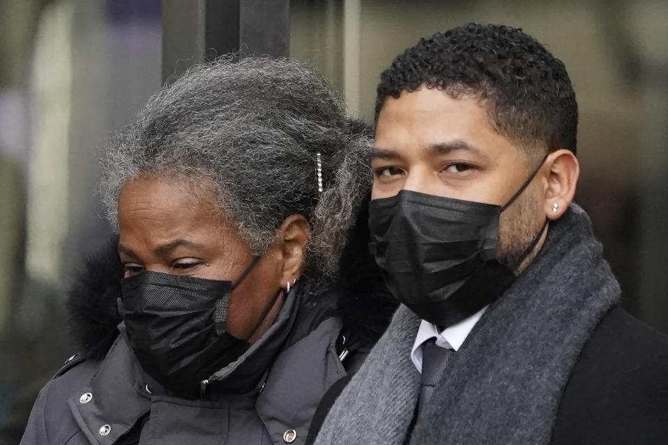 Actor Jussie Smollett departs Tuesday, Dec. 7, 2021, with his mother Janet, the Leighton Criminal Courthouse after day six of his trial in Chicago. Closing arguments are scheduled for Wednesday, in Chicago. (AP Photo/Charles Rex Arbogast)