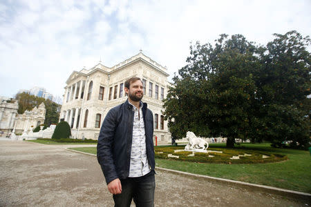 Naz Osmanoglu, a British comedian and member of Turkey's former ruling family, walks at a garden of the Ottoman-era Dolmabahce Palace in Istanbul, Turkey, October 19, 2016. REUTERS/Osman Orsal