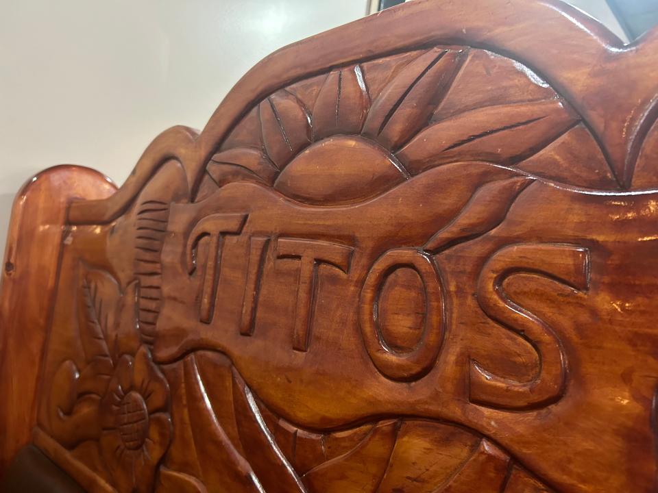 The dining room at Tito's Mexican Grill in Fairlawn features wood-carved booths.