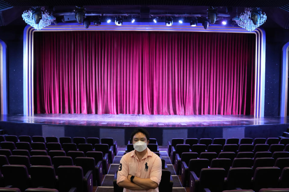 Managing Director of the Phuket Simon Cabaret, Pornthep Rouyrin poses in his theater as he plans for reopening in Phuket, southern Thailand, Tuesday, June 29, 2021. Thailand's government will begin the Phuket Sandbox scheme to bring the tourists back to Phuket starting July 1. The cabaret would not open immediately but its dancers might start with smaller shows in hotels and restaurants until larger number of tourists start to arrive. (AP Photo/Sakchai Lalit)