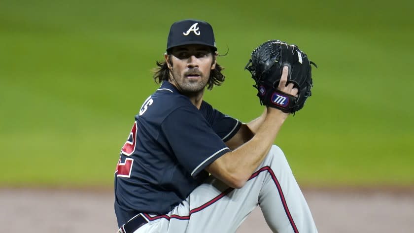 Atlanta Braves starting pitcher Cole Hamels throws a pitch to the Baltimore Orioles during the second inning of a baseball game, Wednesday, Sept. 16, 2020, in Baltimore. (AP Photo/Julio Cortez)