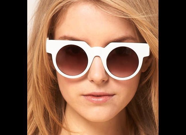 <a href="http://us.asos.com/countryid/2/ASOS-Flat-Top-Round-Sunglasses/xv9rr/?iid=2058313&MID=35719&affid=2135&WT.tsrc=Affiliate&siteID=J84DHJLQkR4-_szgcPFPbib1s5bS5PKSIw" target="_hplink">Asos.com</a>