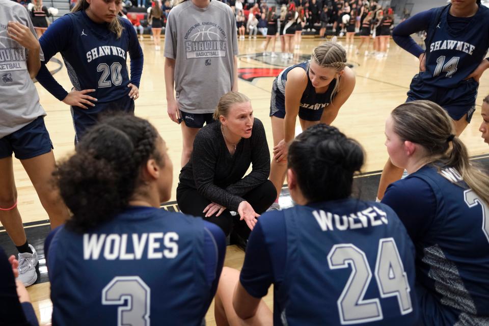 Shawnee coach Wendi Wells talks with her team during a girls high school basketball game between Crossings Christian and Shawnee in Oklahoma City, Friday, Feb. 2, 2024.