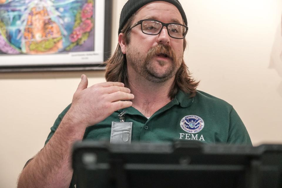 At a registration center in the Cranston Public Library on Sockanosset Cross Road last Thursday, FEMA specialist Joseph Shoemate outlined the registration steps for claims from the storms – now declared federal disasters – on Dec. 17-19 and Jan. 9-13.