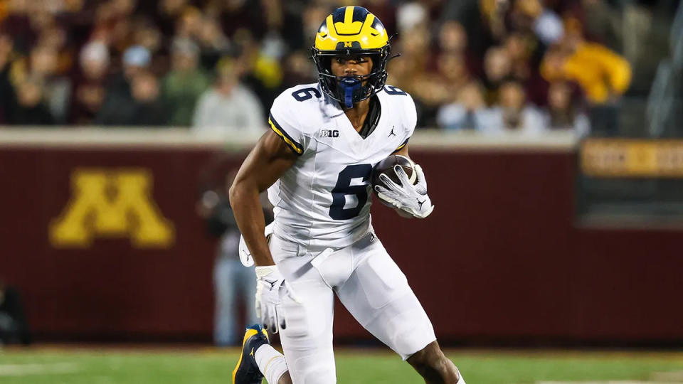 Johnson racked up 604 receiving yards while catching passes from <a class="link " href="https://sports.yahoo.com/ncaaf/players/322778/" data-i13n="sec:content-canvas;subsec:anchor_text;elm:context_link" data-ylk="slk:J.J. McCarthy;sec:content-canvas;subsec:anchor_text;elm:context_link;itc:0">J.J. McCarthy</a> during the Wolverines' 2023 championship campaign.