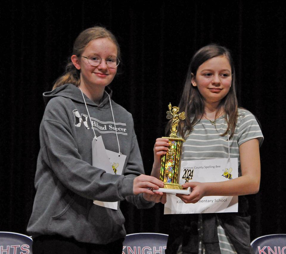 After nearly two hours and 32 rounds of intense spelling Greta Mullet, Hiland Middle School, and Ellie Schafer, Killbuck Elementary School, were named 2024 Holmes County co-Spelling Bee champions.