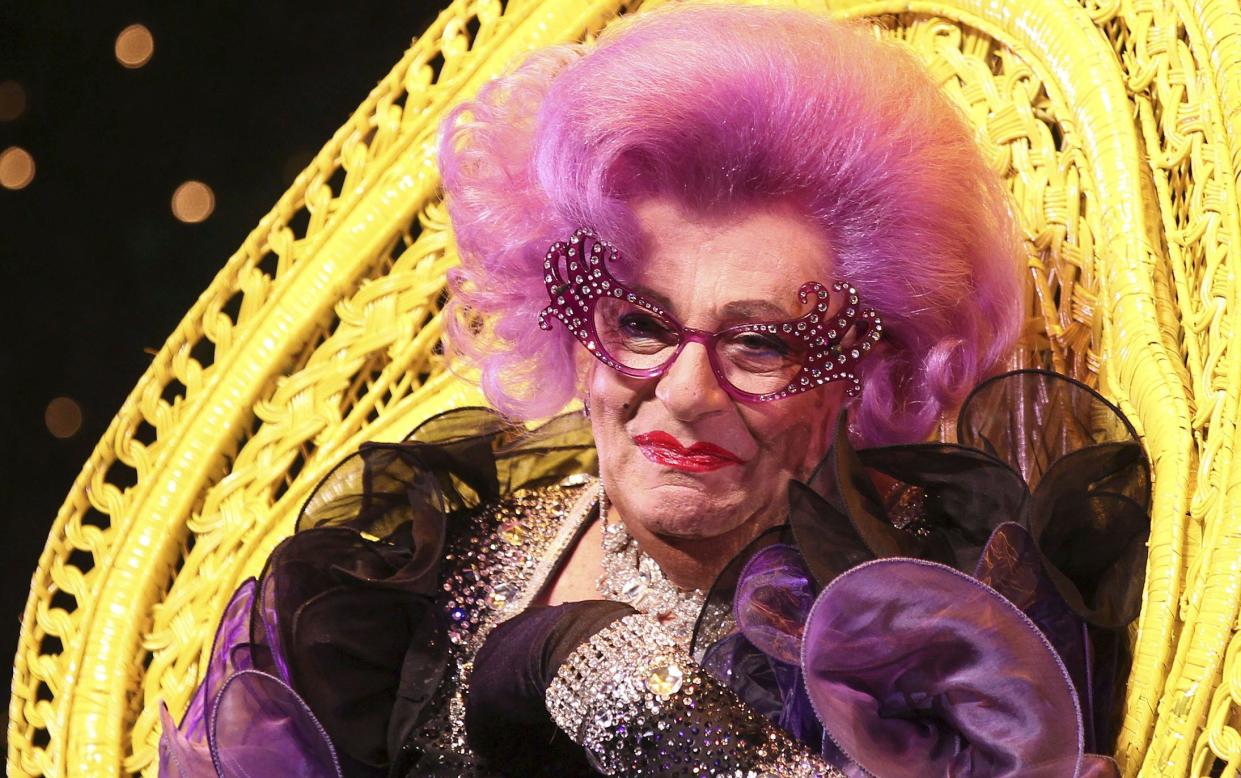 Australian actor Barry Humphries, dressed as Dame Edna Everage, speaks to the media ahead of her farewell show "Eat Pray Laugh!" in Sydney, Australia, on July 5, 2012