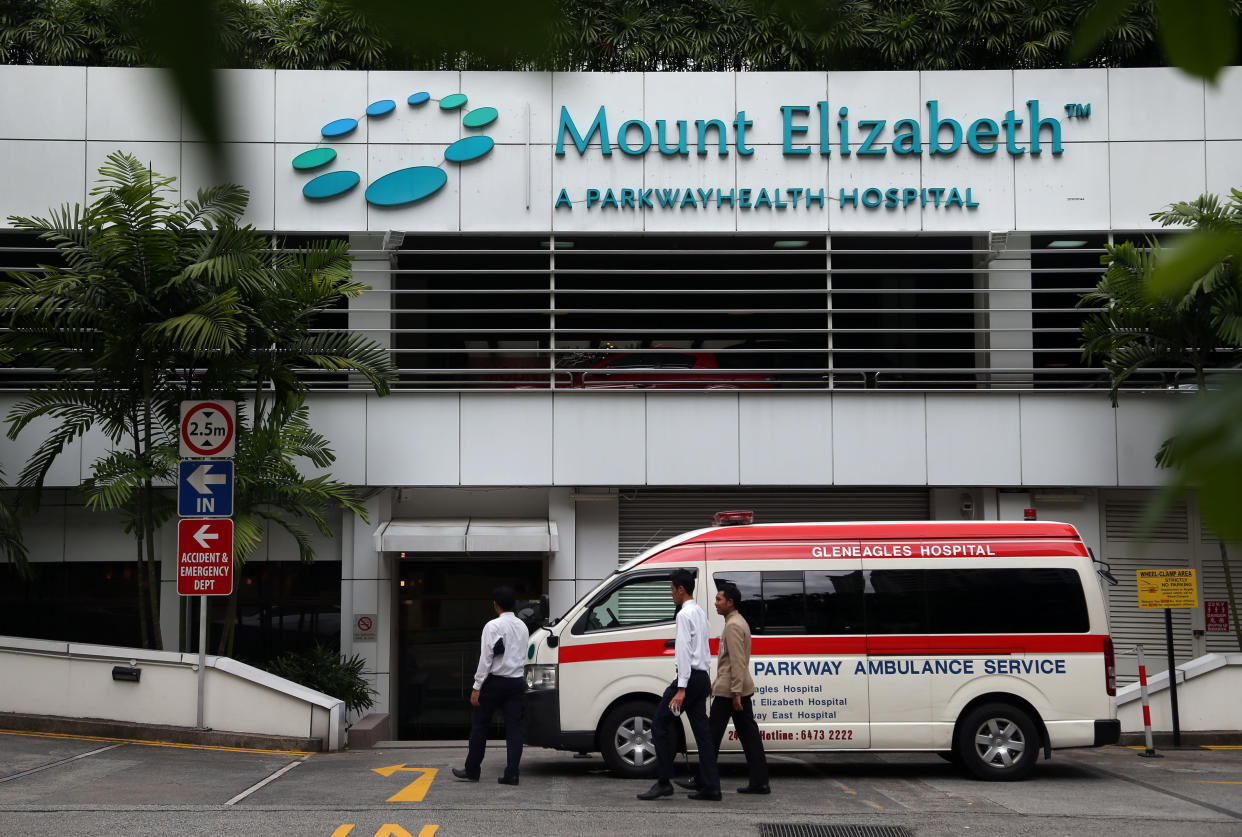 An ambulance is parked outside the Mount Elizabeth Hospital in Singapore Thursday, Dec. 27, 2012. A young woman who was gang-raped and assaulted on a moving bus in the Indian capital was flown Thursday to the Singapore hospital for treatment of severe internal injuries that could last several weeks, officials said. (AP Photo/Wong Maye-E)