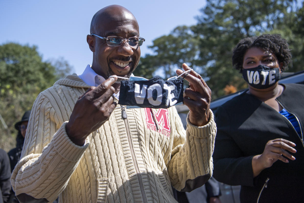 Rev. Raphael Warnock, one of the two Democratic Senate candidates in Georgia, and Stacey Abrams, a former candidate for Georgia governor, at a Sunday campaign event in Atlanta. Warnock won election. (Photo: Tom Williams/CQ-Roll Call via Getty Images)