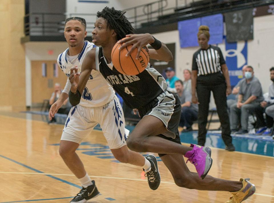 South Lake’s Marvin Windom (4) drives to the basket during Friday's game against host Mount Dora Christian Academy.