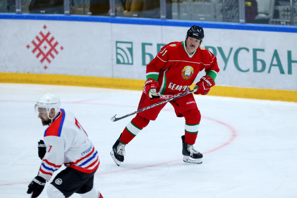 Image: Belarusian President Alexander Lukashenko plays in a hockey game in Minsk on Saturday. (Andrey Pokumeiko / BelTA / via Reuters)