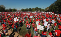 Striking Chicago teachers and their supporters attend a rally at Union Park September 15, 2012 in Chicago, Illinois. An estimated 25,000 people gathered in the park in a show of solidarity as negotiations on a labor contract continue. Yesterday Chicago Teachers Union President Karen Lewis reported the "framework" for an agreement has been reached and union delegates are expected to decide tomorrow if they should end the strike. More than 26,000 teachers and support staff walked off of their jobs on September 10 after the union failed to reach an agreement with the city on compensation, benefits and job security. With about 350,000 students, the Chicago school district is the third largest in the United States. (Photo by Scott Olson/Getty Images)