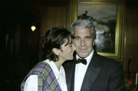 Ms Maxwell embraces Epstein at a black tie event (US District Attorney’s Office)