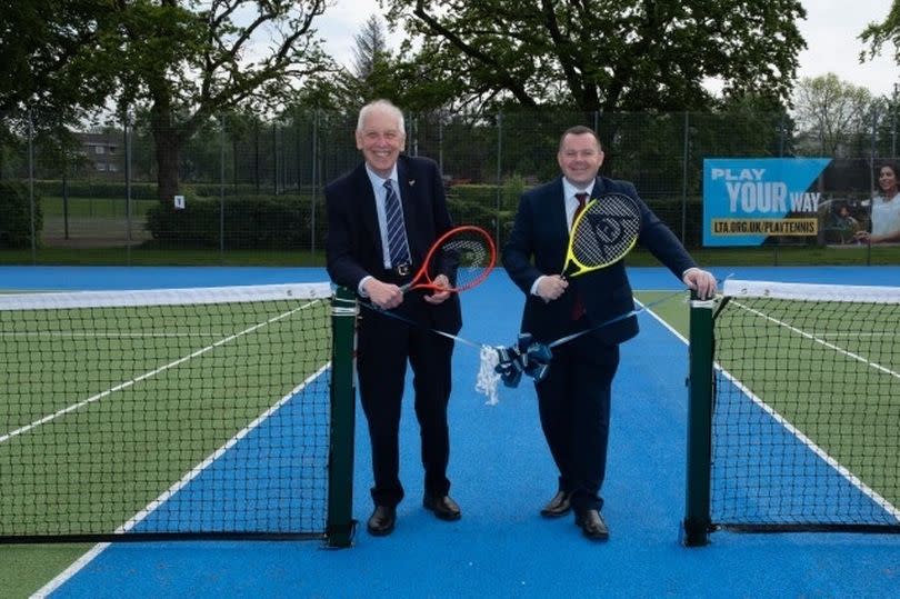 Councillor Robert Brown and Council Leader Joe Fagan opening up the tennis courts -Credit:Copyright Unknown