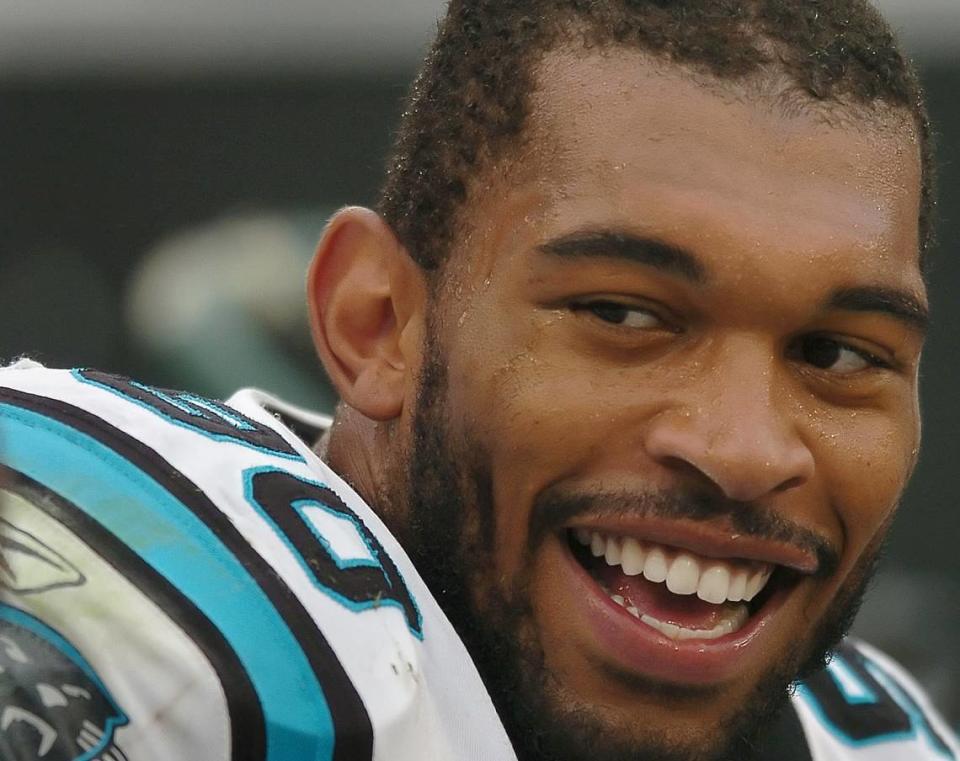 In 2006, Carolina Panthers defensive end Julius Peppers laughs on the team bench after chasing down Cleveland Browns quarterback Charlie Frye for a quarterback sack. Peppers had 159.5 sacks in his career, fourth all-time, and became a first-ballot Pro Football Hall of Famer in 2024.