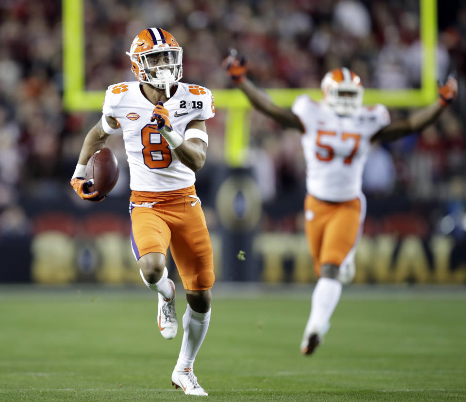 FILE - In this Jan. 7, 2019, file photo, Clemson's A.J. Terrell intercepts a pass for a touchdown during the first half the NCAA college football playoff championship game against Alabama, in Santa Clara, Calif. Terrell was selected to The Associated Press All-Atlantic Coast Conference football team, Tuesday, Dec. 10, 2019. (AP Photo/Ben Margot, File)