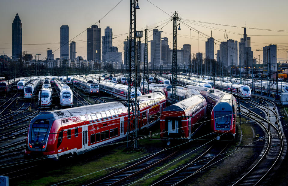 Trains are parked near the central train station in Frankfurt, Germany, Monday, March 27, 2023. Germany faces a nationwide public transport strike on Monday. (AP Photo/Michael Probst)