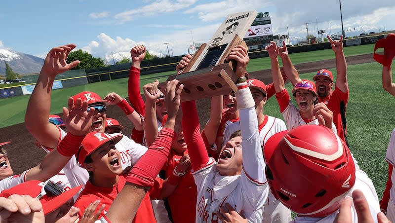Kanab’s Kale Glover (11) and teammates celebrate winning the 2A baseball state tournament championship against South Sevier in Orem on Saturday, May 11, 2024.