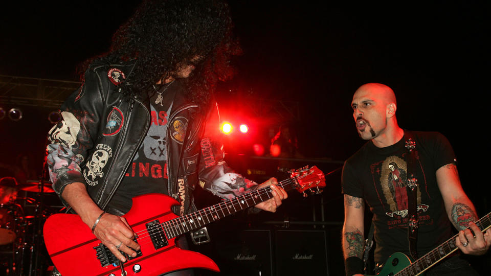 Slash and Dave Kushner of Velvet Revolver during Velvet Revolver Takes Over Sunset Blvd with Surprise Concert - October 13, 2004 at Sunset Blvd in Los Angeles, California, United States.