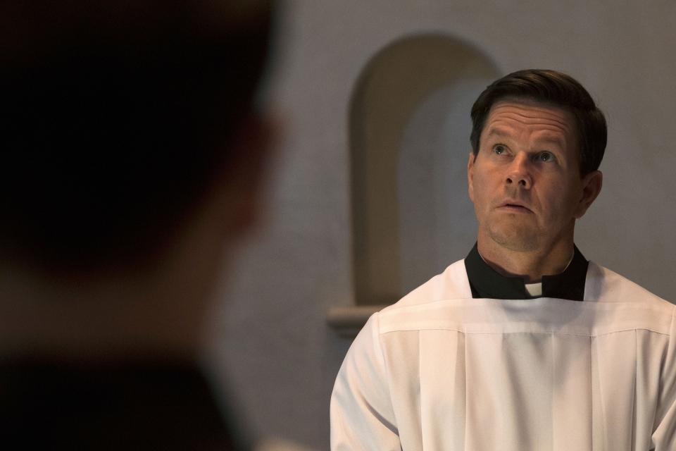 Mark Wahlberg in a priest uniform