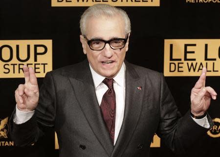 Director Martin Scorsese reacts during a photocall for his film "The Wolf of Wall Street" in Paris, December 9, 2013. REUTERS/Jacky Naegelen