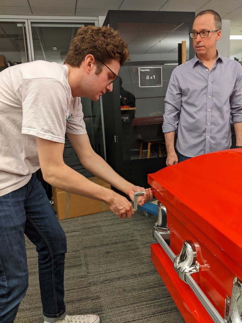 Titan Casket CEO Scott Ginsberg teaching me how to unlock the casket. 
