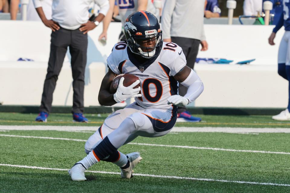 Denver Broncos wide receiver Jerry Jeudy (10) gains yards after the catch during the first quarter against the New York Giants at MetLife Stadium.
