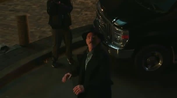 J. Jonah Jameson by a van on the street in "Spider-Man: No Way Home"