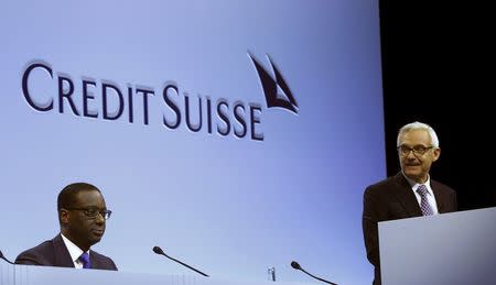 Chief Executive Tidjane Thiam listens to the speech of Chairman Urs Rohner (R) of Swiss bank Cedit Suisse during the annual shareholder meeting in Zurich, Switzerland April 29, 2016. REUTERS/Arnd Wiegmann