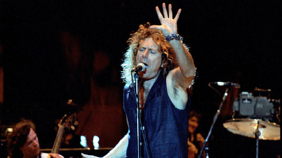 GEORGE, WA - May 27: Singer Robert Plant of Led Zeppelin performs on stage at The Gorge Amphitheater May 27, 1995 in George, Wa.