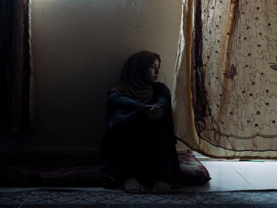 Nooha, 19, remembers the day her father was killed in 2014 by air strikes while on his way to buy food for the family, in the residential area of Fallujah (Paddy Dowling/Qatar Fund For Development)