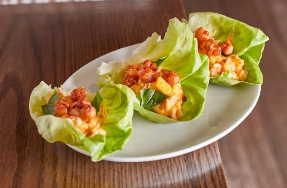 <p>Angie Tucker</p><p>Lump crabmeat and sweet mango fill these lettuce wraps with flavor.</p><p><strong>Get the recipe: <a href="https://parade.com/recipes/lettuce-wraps" rel="nofollow noopener" target="_blank" data-ylk="slk:Bibb Lettuce Wraps;elm:context_link;itc:0;sec:content-canvas" class="link ">Bibb Lettuce Wraps</a></strong></p>