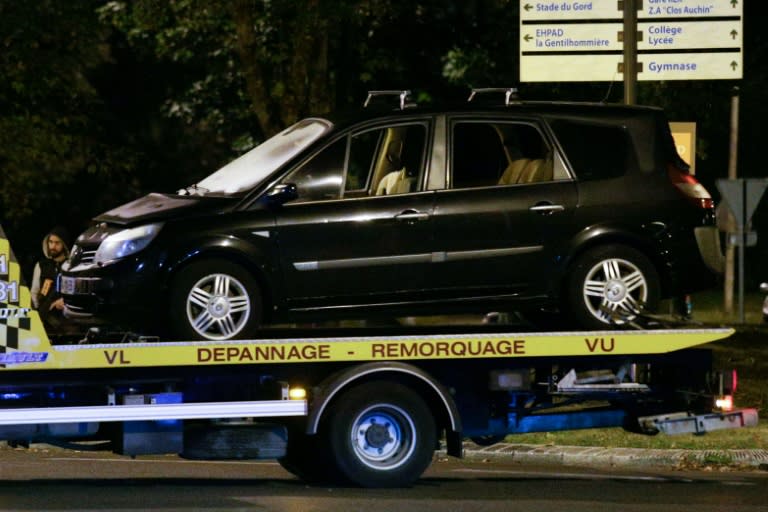 A vehicle allegedly belonging to one of the arrested woman is moved by a wrecker in Boussy-Saint-Antoine south of Paris where female suspects, said to have been planning new acts of violence, were arrested