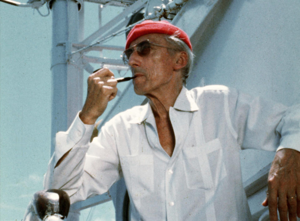 This image released by National Geographic shows Jacques Cousteau aboard his ship "Calypso" in the 1970s, from the documentary “Becoming Cousteau,” opening in theaters Friday. The film attempts to frame the singular Cousteau and his legacy as an early environmental defender of increasingly imperiled waters. (The Cousteau Society/National Geographic via AP)