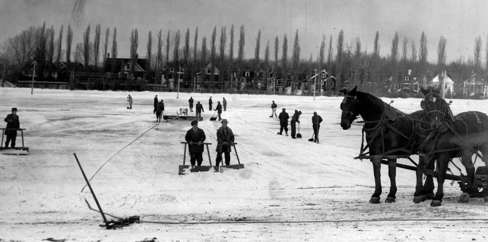 Workers use scrapers to prepare the ice at Cobbs Hill Park for skaters in this 1941 photo.