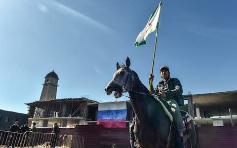 Some Ingushetia residents have demonstrated against the territory agreement from horseback - Credit: Vasily Maximov/AFP