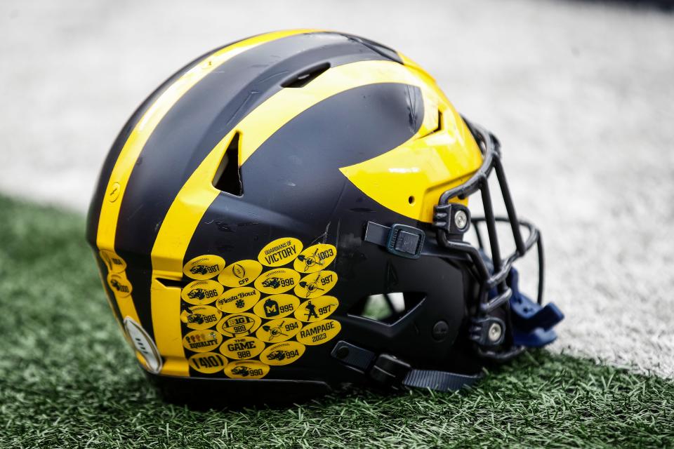 A Michigan football helmet on the field during warmup at the spring game at Michigan Stadium in Ann Arbor on Saturday, April 20, 2024.