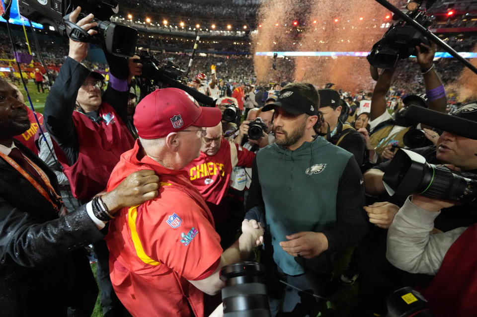 Kansas City Chiefs head coach Andy Reid and Philadelphia Eagles head coach Nick Sirianni greet each other after Super Bowl LVII at State Farm Stadium in Glendale on Feb. 12, 2023.