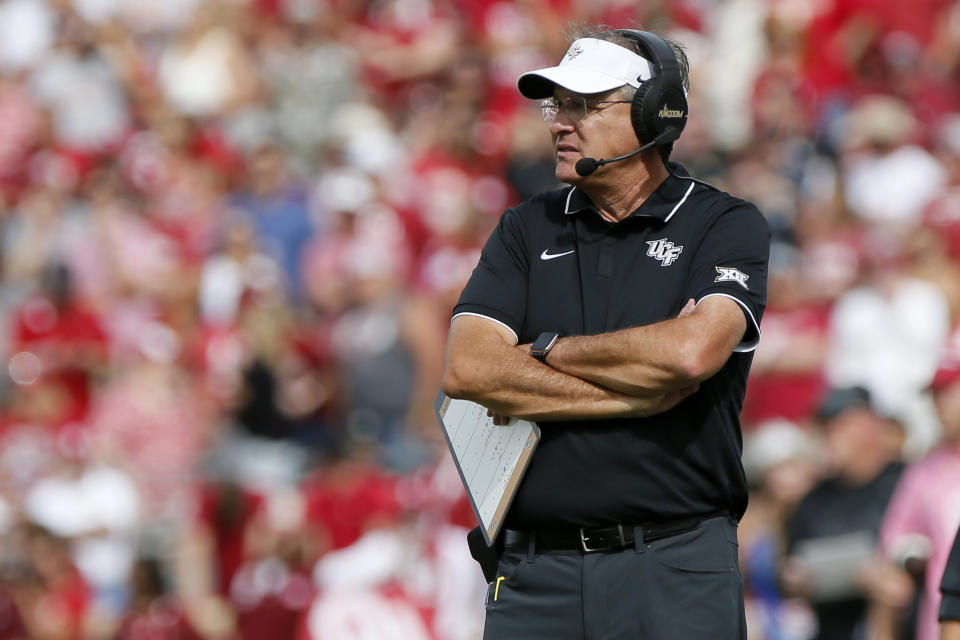 UCF head coach Gus Malzahn watches as his team plays Oklahoma in the first half of an NCAA college football game, Saturday, Oct. 21, 2023, in Norman, Okla. (AP Photo/Nate Billings)