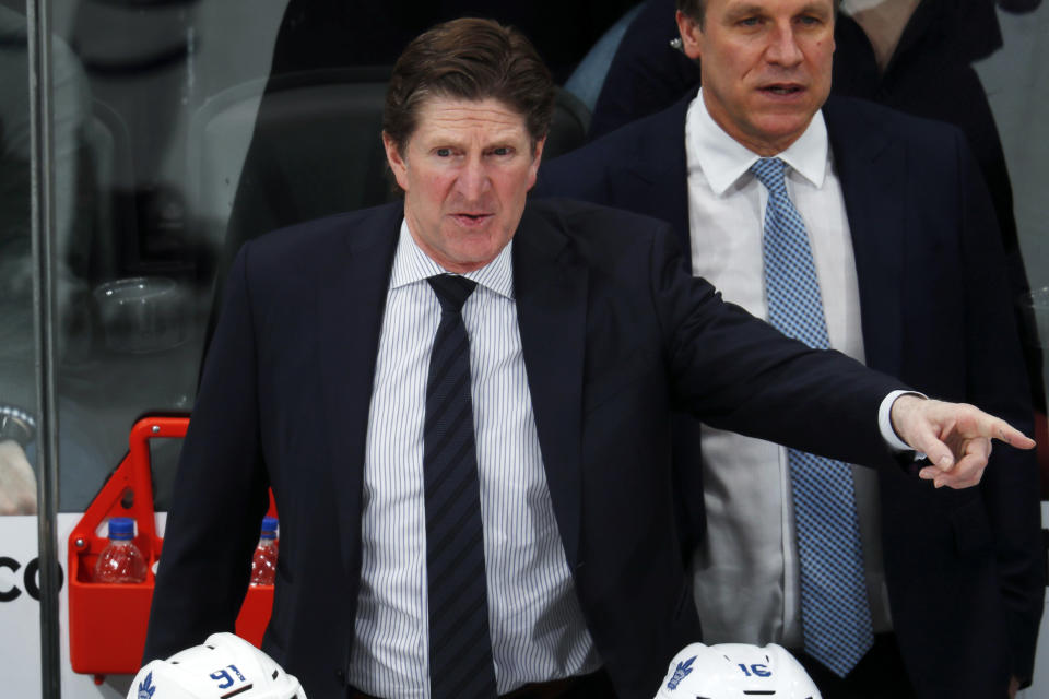 FILE - Toronto Maple Leafs head coach Mike Babcock directs his team against the Colorado Avalanche in the third period of an NHL hockey game, Tuesday, Feb. 12, 2019, in Denver. Babcock is back in the NHL as coach of the Columbus Blue Jackets. The Blue Jackets announced Saturday, July 1, 2023, they’ve hired the Stanley Cup winner to take over behind the bench. (AP Photo/David Zalubowski)
