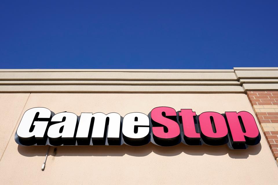 A GameStop sign is displayed above a store, Jan. 28, 2021. A GameStop clerk who police say fatally shot a fleeing shoplifter has been charged with manslaughter, police said in a Wednesday, Oct. 18, 2023, press release.