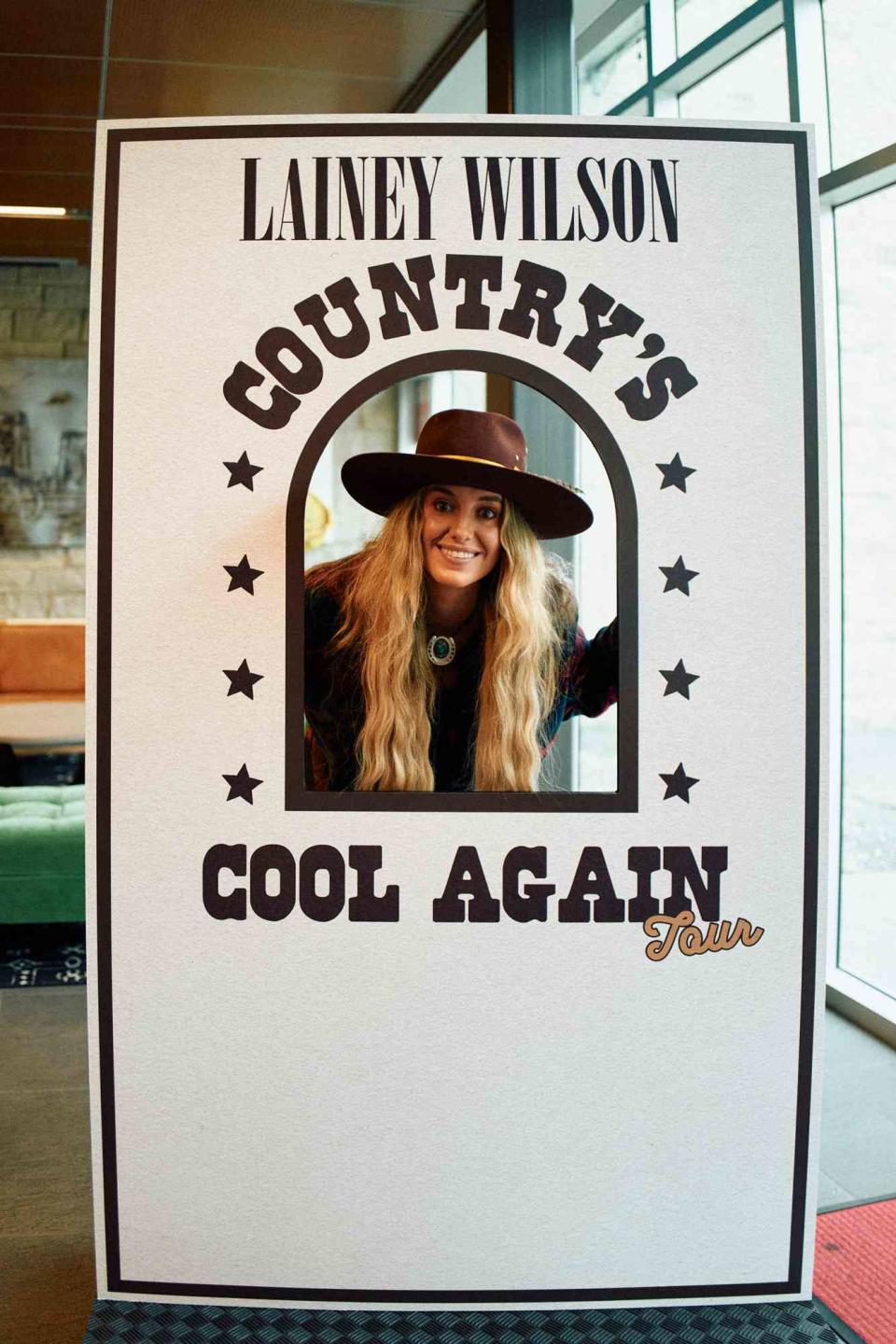 <p>Erick Frost</p> Lainey Wilson mans the tickets booth in Nashville in late October