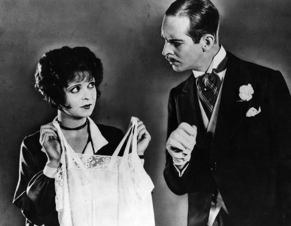 Clara Bow and William Austin in a scene from the 1927 film 'It'.   (Hulton Archive / Getty Images)