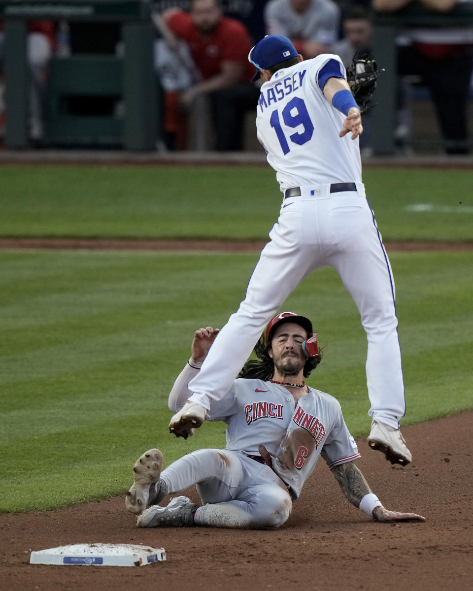 Cincinnati Reds' Jonathan India (6) is tagged out at second by Kansas City Royals second baseman Michael Massey (19) for the second out of a double play hit into by Elly De La Cruz during the fourth inning of a baseball game Wednesday, June 14, 2023, in Kansas City, Mo. (AP Photo/Charlie Riedel)