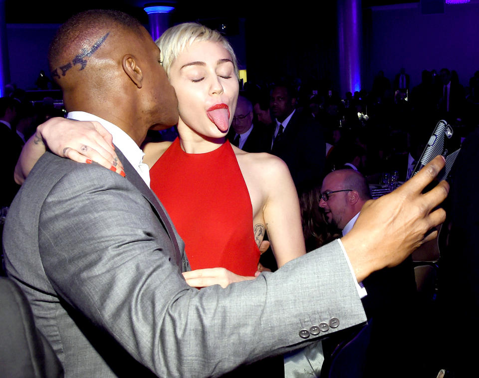 Jamie adores Miley! The actor posed with the "Wrecking Ball" singer at a pre-Grammys gala in 2015, leaning over to give her a cute kiss on the cheek. Naturally, Cyrus posed with her tongue out and eyes closed.