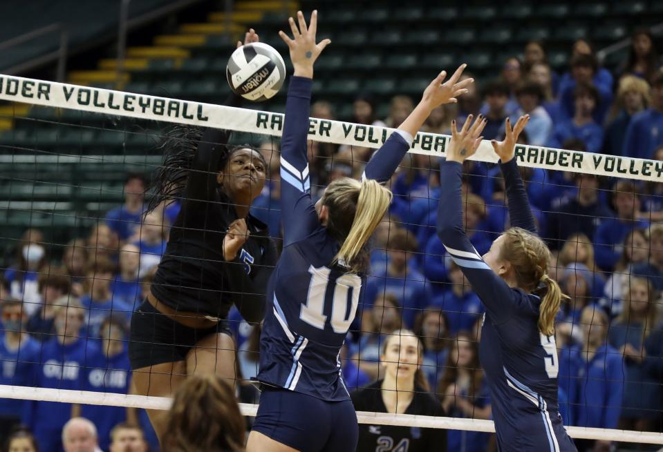 14. Olentangy Liberty's Michelle Ezenekwe spikes the ball against Rocky River Magnificat during the Division I state final Nov. 13 at Wright State. The Patriots lost 25-21, 24-26, 25-14, 25-19 in their first appearance in the championship match.